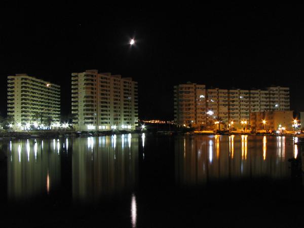 Sea in the moonlight
Directly from the walking steep path of the main street from La Manga takes photos: night exposure of buildings and in froun a little bit Mar Menor in the moonlight.