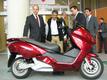 Prince Albert visits an electric Maxi Scooter